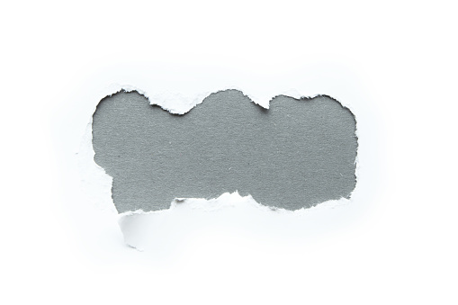 A three-dimensional hole in a white background, space for text on a gray background.
