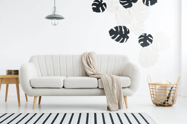 istock Beige sofa in living room 932790572
