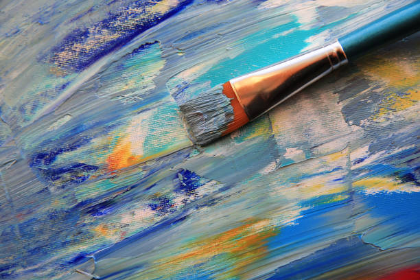 istock Closeup background of brush and palette. 932790856