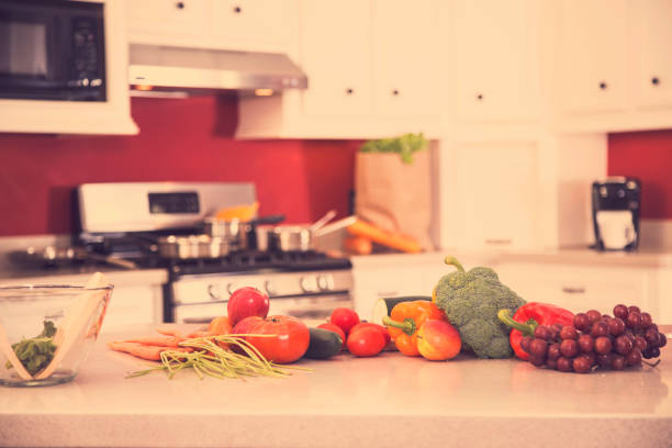 istock Fruits and vegetables on kitchen counter, salad. 932797858