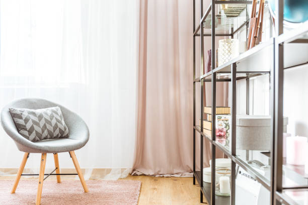 istock Black rack and gray armchair 932803004