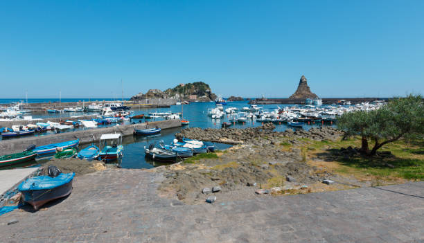 istock Aci Trezza Marina dei Ciclopi boats harbor, Sicily 932803050