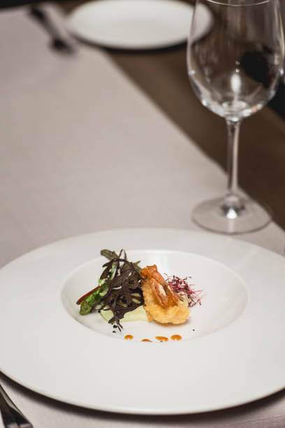 istock delicious shrimp in a restaurant. small portion 932806102