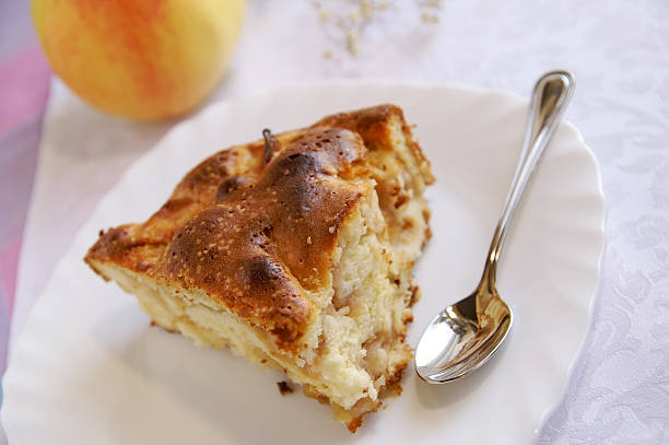 istock Piece of golden apple-pie on a white table 93280949