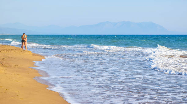 istock The couple on the beach. 932815934