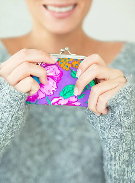 istock hands holding money pocket wallet 93282075
