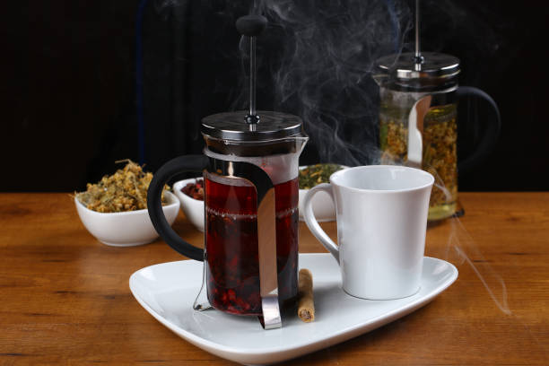 istock Cups of tea with french press 932821654