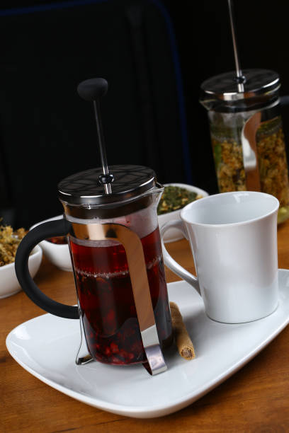 istock Cups of tea with french press 932821826