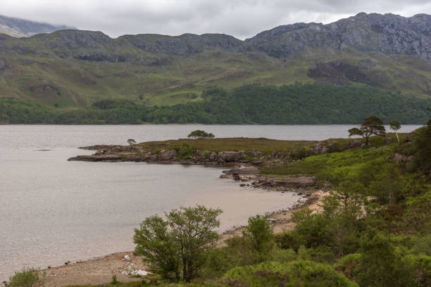 istock Loch Marlee with peninsula, SW Highlands Scotland. 932830852