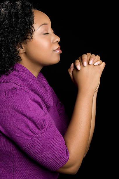 Young Woman Praying stock photo