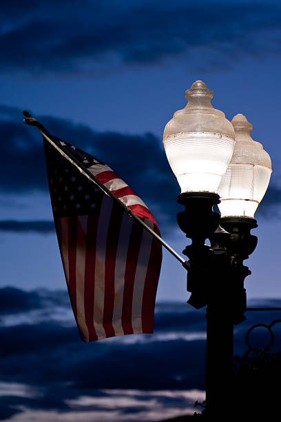 istock American Flag Lit by Street Lights 93286059