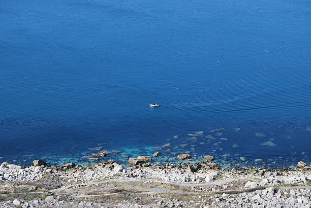 lonely fisherman stock photo