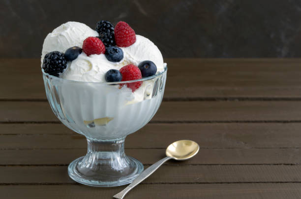 istock Ice cream balls in a glass vase. 932893680