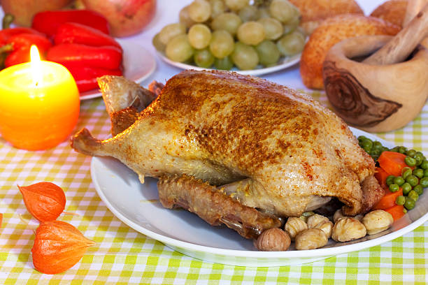 istock festive roast duck with carrot,pea and chestnuts 93289946