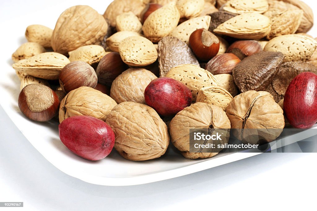 Mistura de frutos secos com placa branca - Royalty-free Alimentação Saudável Foto de stock