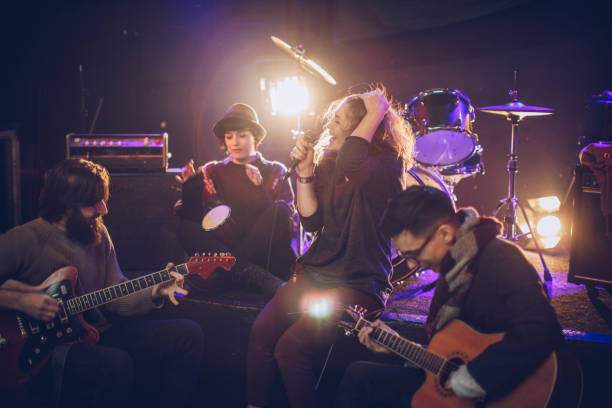 istock Rock band having rehearsal 932920818