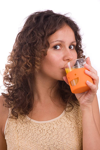 istock Girl is drinking orange juice. 93292241