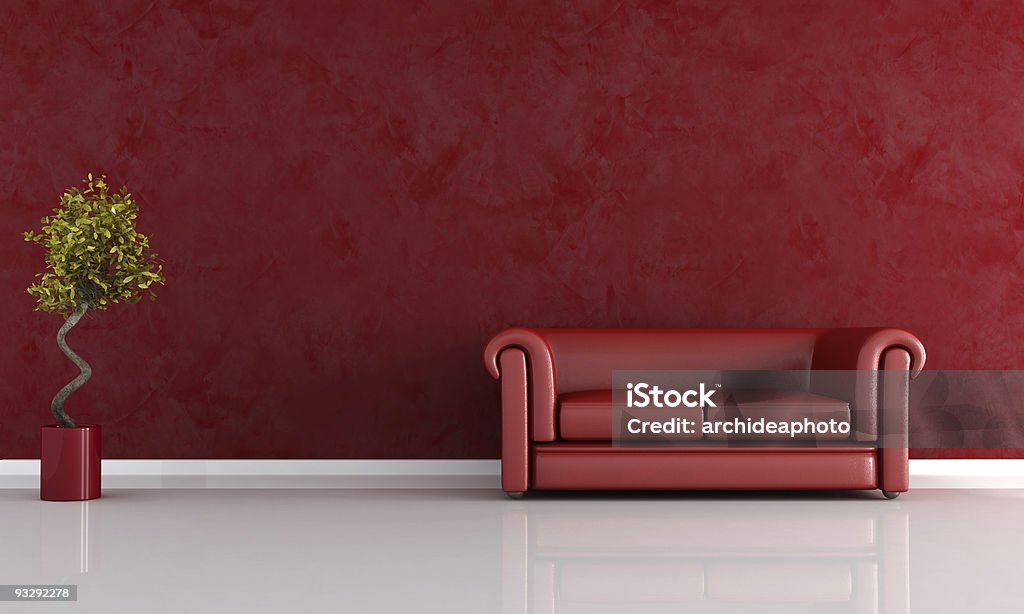 red living room red leather sofa against stucco wall - rendering Domestic Room Stock Photo