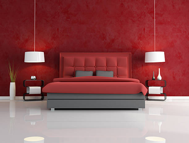 rosso camera da letto di lusso - red bed foto e immagini stock