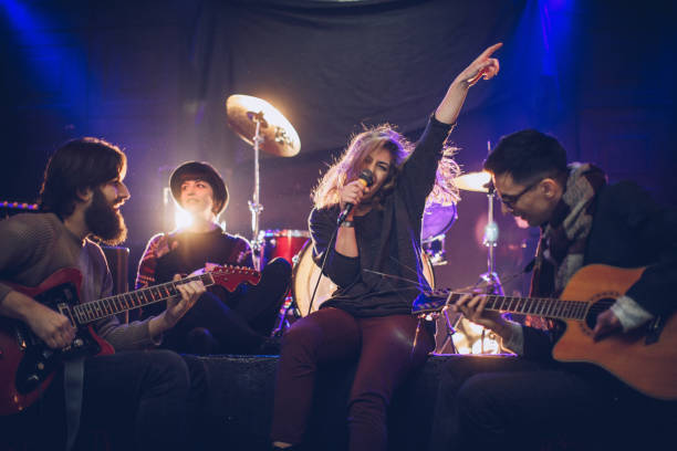 istock Band performing at a nightclub 932925598