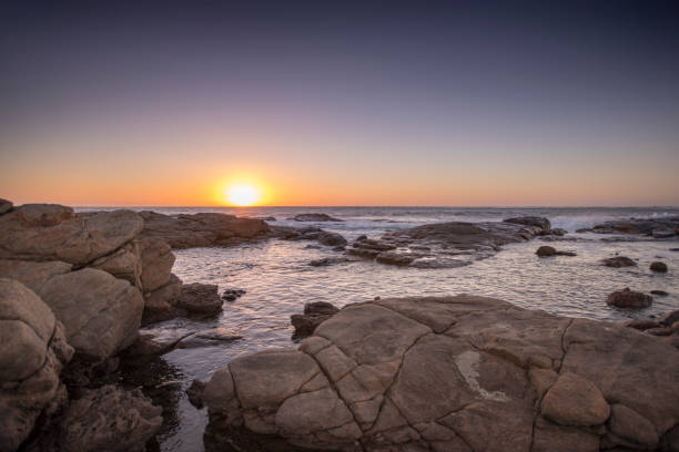 istock Surf's Up Sun's Down at Surfers Point 932931188