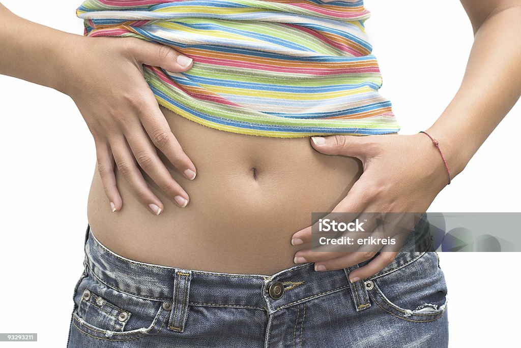 Beautiful belly Woman with a  great body shape showing is belly Active Lifestyle Stock Photo