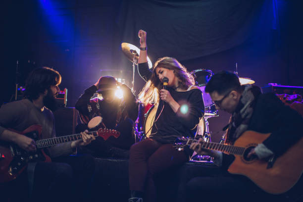 istock Rock band in the club 932941534