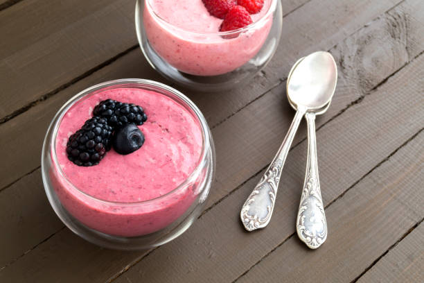 istock Berry natural yogurt in a glass bowl. 932947658