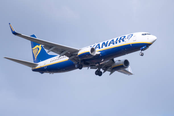 Ryanair Boeing 737 is  approaching Brussels Airport Steenokkerzeel,Belgium - March 14, 2018: Boeing 737 with registration number EI-FIW   from Ryanair on the approach of Brussel Airport. 
Ryanair is an Irish  low-cost airline. boeing 737 photos stock pictures, royalty-free photos & images