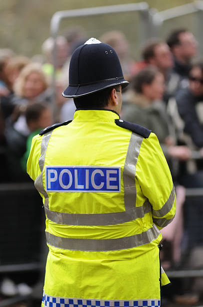 polícia britânica - police helmet - fotografias e filmes do acervo