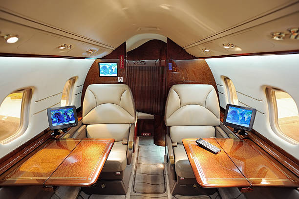 jet interni aziendale - vehicle interior corporate jet jet private airplane foto e immagini stock