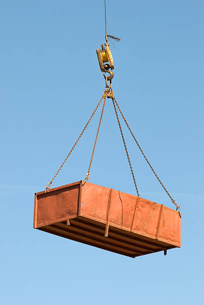 istock crane lifts steel basket 93298104