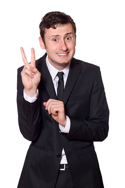 istock intimidated businessman showing the peace sign 93298476