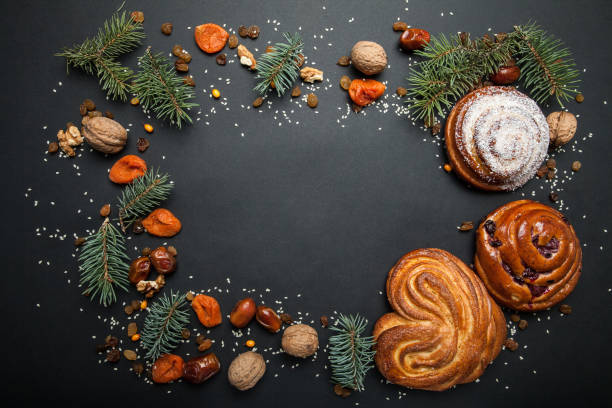 istock Sweet homemade buns with spruce branches. 932990508