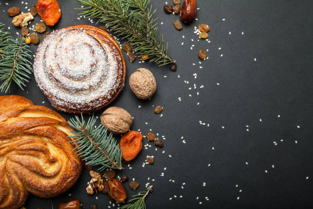 istock Sweet homemade buns with spruce branches. 932999394
