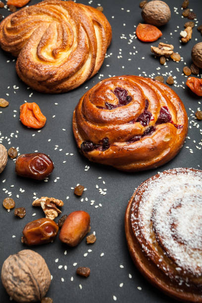 istock Sweet homemade buns with spruce branches. 933001450