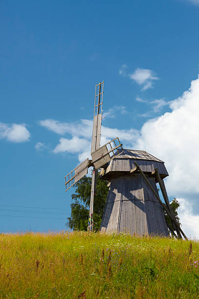 istock Old mill in the field of a yellow grass 93300365