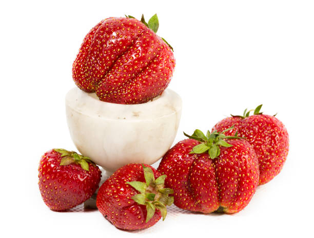 istock strawberry, ripe red berries and marble vase 933003924