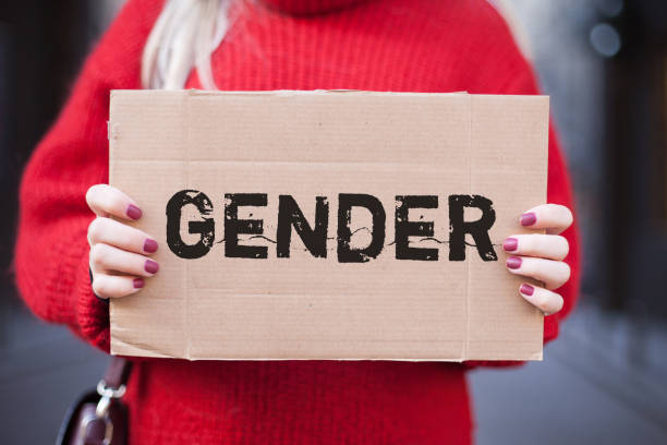 istock The girl is holding a sign 933004032