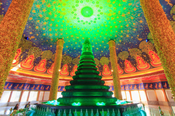 istock Golden pagoda with lighting inside at Wat Paknam Bhasi Charoen 933004554