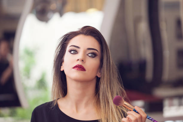 istock Portrait of a beautiful model after make-up session 933019478