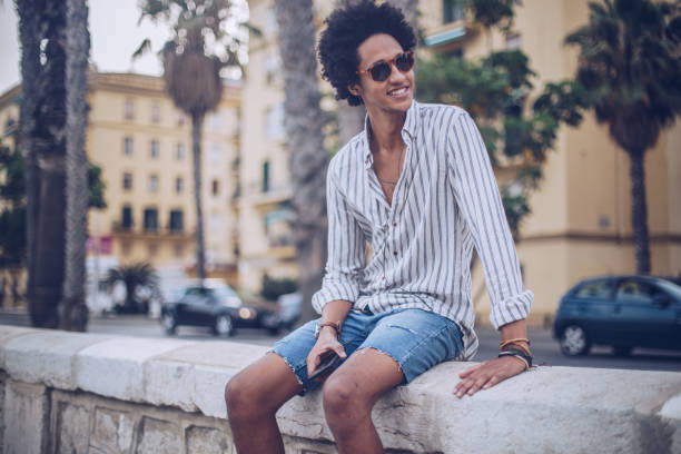 istock Man enjoying music outdoors 933090800