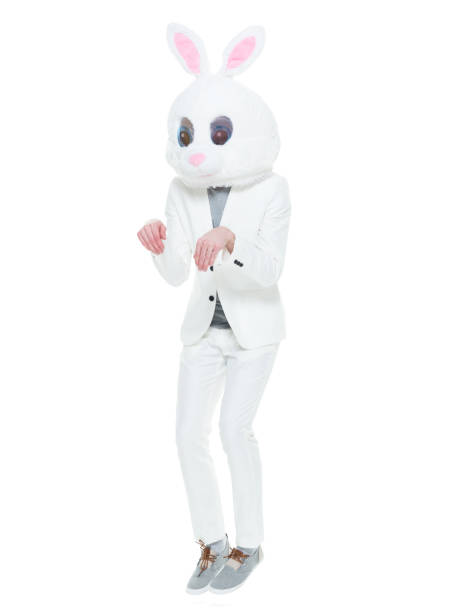 istock Man in bunny costume doing bunny hop 933094484