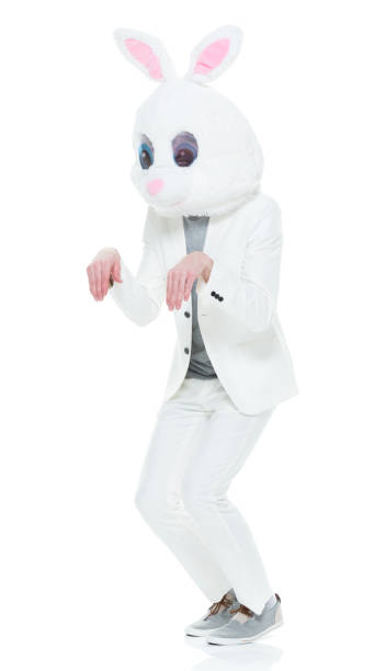istock Man in bunny costume doing bunny hop 933094676