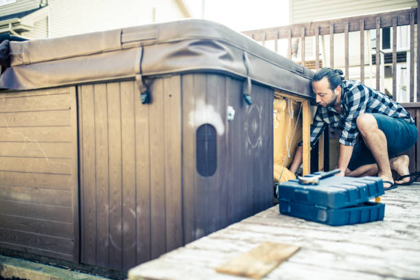 istock Handyman repairing a hot tub 933101836