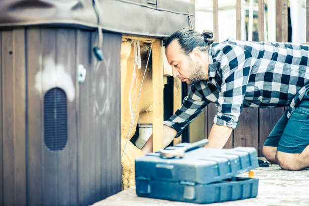 Handyman repairing a hot tub