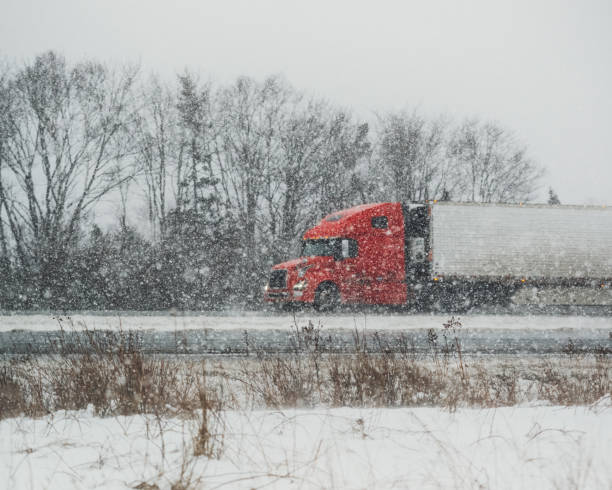 istock Trucking in Winter Storm 933111340