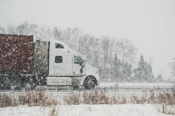istock Trucking in Winter Storm 933111344