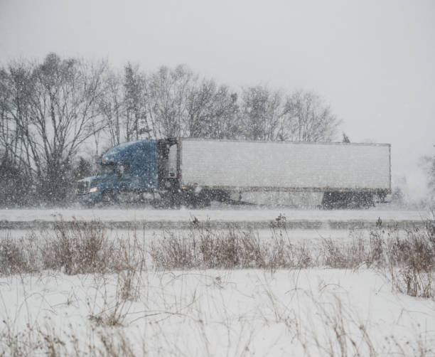 istock Trucking in Winter Storm 933111388
