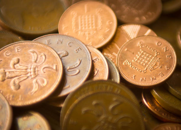 one and two pence coins - british currency coin two pence coin british coin imagens e fotografias de stock